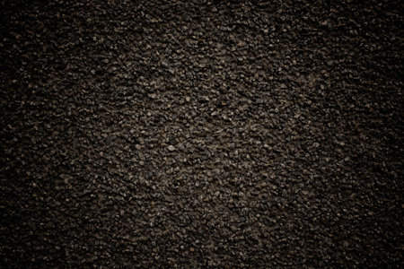 stone background black color with a grainy textureの写真素材