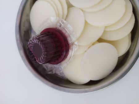 Cup of wine and unleavened bread for holy communionの写真素材