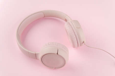 pink headphones on pink backgroundの写真素材