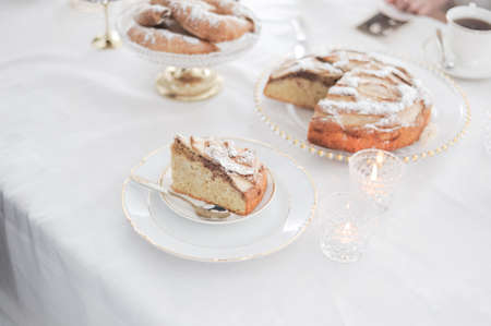 table served and decorated for a family festive gala tea partyの写真素材