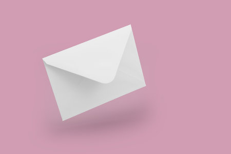 White envelope mockup, blank template, levitation whis shadow, pink backgroundの写真素材
