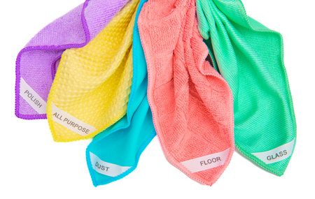 Colorful, dry microfiber cloths for cleaning various surfaces in the kitchen, bathroom and other rooms. Cleaning service concept. Regular cleaning.の写真素材