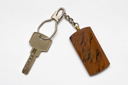 Key with key ring on white background