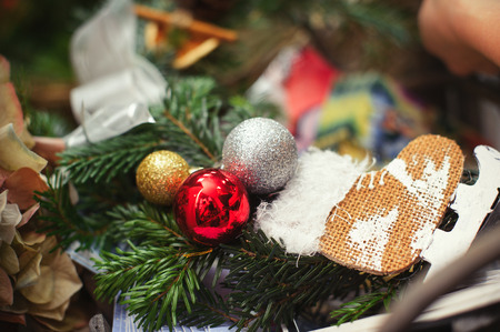 The process of making handicraft christmas wreathの写真素材