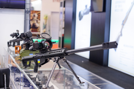 Kiev, Ukraine - October 12, 2017: new sniper rifle with a night vision device at the exhibition Arms...