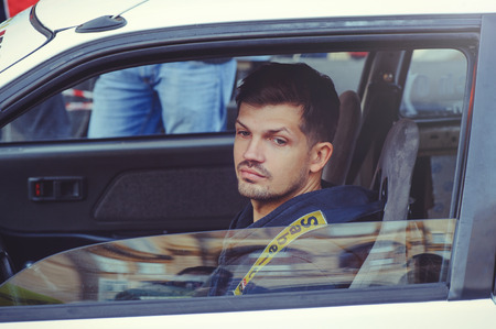 Kiev, Ukraine - October 22:  racer in the car.  automobile slalom and drift competitions in the city center, car on the road with cones in  Kiev, Ukraine.のeditorial素材