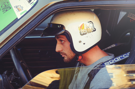 Kiev, Ukraine - October 22:  racer in the car.  automobile slalom and drift competitions in the city center, car on the road with cones in  Kiev, Ukraine.のeditorial素材