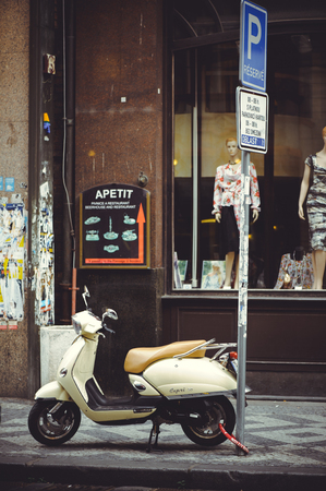 PRAGUE, CZECH REPUBLIC - JUNE 2016: Parked motor scooter on the street in Prague, parkingのeditorial素材