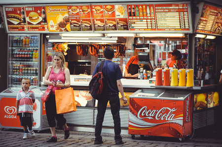 PRAGUE, CZECH REPUBLIC - JUNE 2016: A cozy and beautiful tourist street of old architecture sells food, small shops and playgroundsのeditorial素材