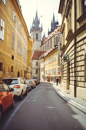 PRAGUE, CZECH REPUBLIC - JUNE 2016: cozy and beautiful tourist street of old architecture parked carsのeditorial素材