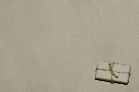 sale, advertising gift on kraft paper, space for text.の写真素材