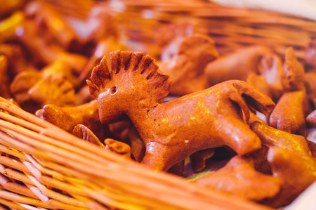 baking of horse figurines, Christmas traditions, mysterious supper. the baking is in a wicker basket.の写真素材