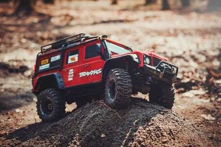 Kiev, Ukraine - APRIL, 2018 : radio-controlled model of an off-road car, trophy crossing the road...