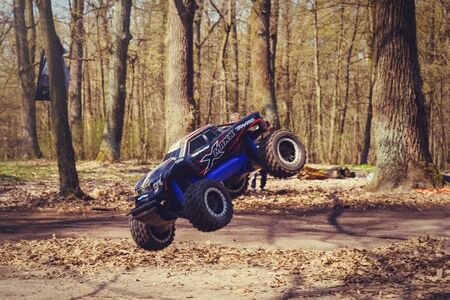 Kiev, Ukraine - APRIL, 2018 : car bashing on the track radio-controlled models flying with a...
