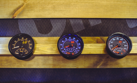 sale of modern and classic motorcycle and car speedometers, dashboard.の写真素材