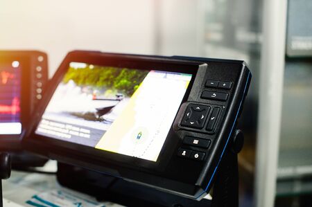 boat echo sounder and navigator, sale of goods for fishing and recreation