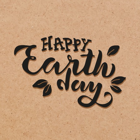 Handwritten lettering text 'Happy Earth Day'. sketched text for postcard banner template. typography for eco friendly ecology concept. World environment background. illustration cork backgroundの写真素材