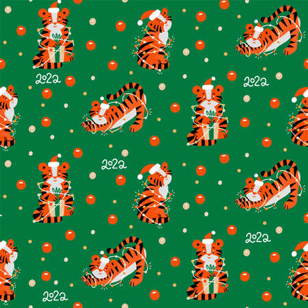 Christmas colored seamless pattern with 2022 New Years symbol. Small Tiger with garlands, christmas baubles, confetti and lettering. Flat vector illustration.のイラスト素材