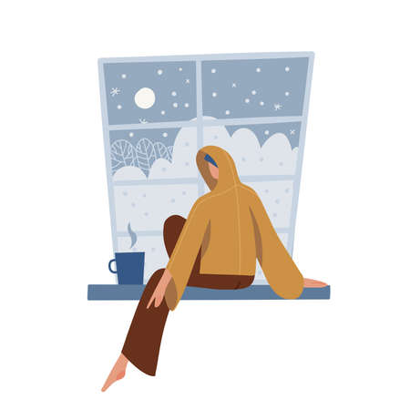 Young Woman wearign hoodie sitting on windowsill with cup of hot tea. Winter cozy concept. Rest at home in winter. A girl looks out the window at falling snow. Flat hand drawn vector illustration.のイラスト素材