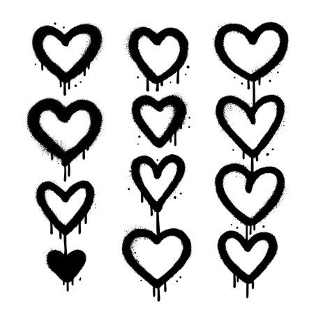 Grunge graffiti hearts icons set. Urban airbrush scribble ink heart shapes icons drawn with spray paint. Textured vector illustration.のイラスト素材