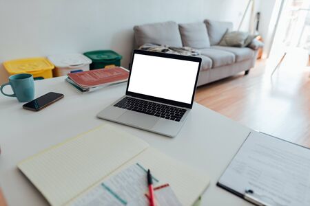 Comfortable workplace. Working from home. Laptop on the table. Home interior, freelance. stay homeの写真素材