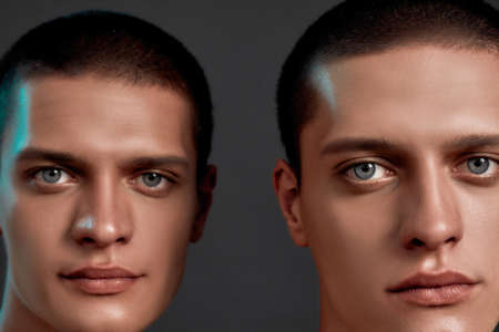 Close up portrait of two young caucasian twin brothers looking at camera, posing together isolated...