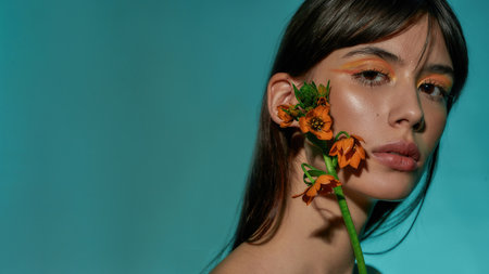 Flower moving along the face of a woman