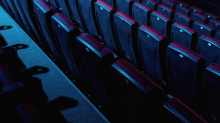 Close up shot of cinema seats in an empty movie theater