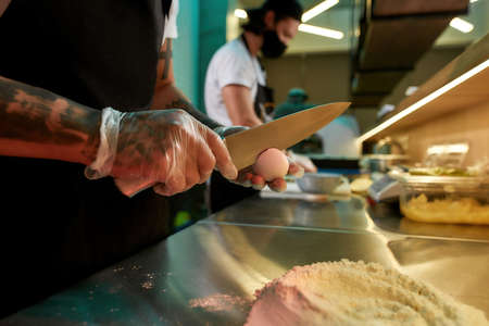 Man preparing food in the kitchenの写真素材