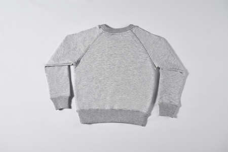 Gray raglan lying on a white background