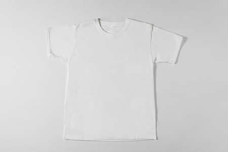 White t-shirt on grey backgroundの写真素材