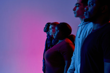 Young multiracial people standing side by side during demonstrationの写真素材