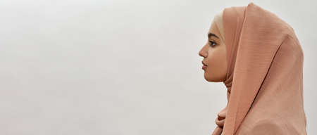 Profile of young arabian girl in traditional hijabの写真素材