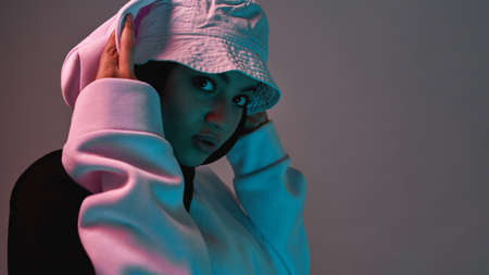 Stylish young arabic girl in hijab and panama hatの写真素材