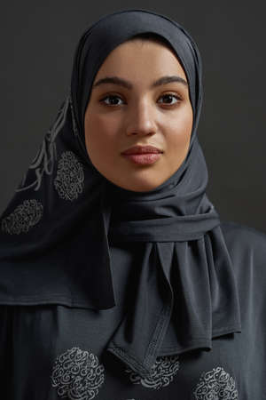 Portrait of young arab woman wearing traditional hijabの写真素材