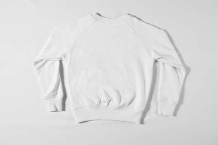 White jacket lying on a light backgroundの写真素材