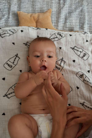 Baby is using sense of taste to explore world