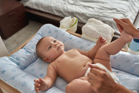 Morning stretching is important care for infant babyの写真素材