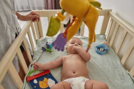 Colorful toys to attract infant childs attentionの写真素材