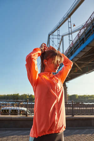 Young sporty woman ready for workout runの写真素材