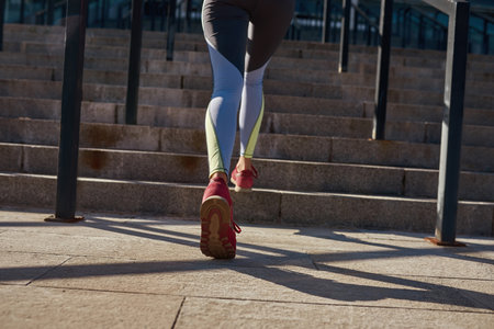 Back close up of active woman workout outdoors