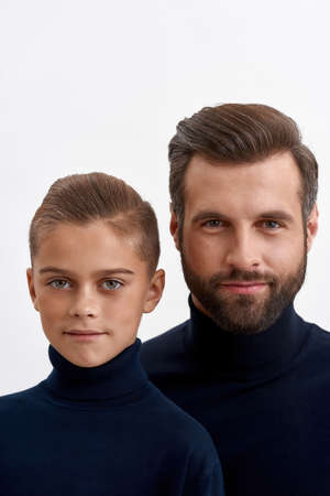 Portrait of Caucasian father and small son pose togetherの写真素材