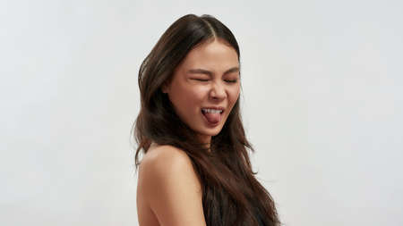 Displeased Asian woman show discontent dislike