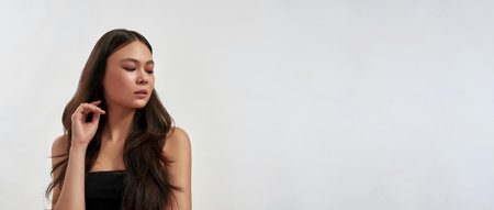 Web banner of Asian woman look at blank copy spaceの写真素材