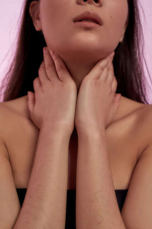 Close up of Asian woman model touch body skinの写真素材