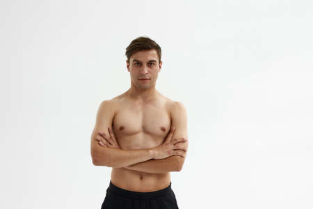 Young caucasian ballet dancer with crossed armsの写真素材