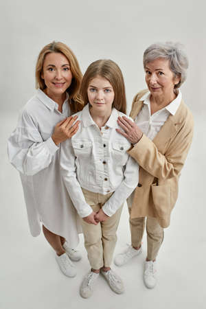 Top view of caucasian family of three femalesの写真素材