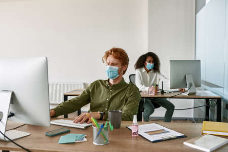 Employees work in office during  pandemic