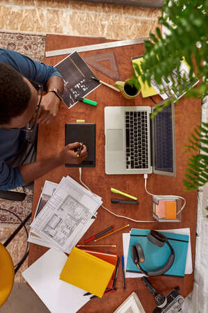 Top view of male architect draw on graphics tabletの写真素材
