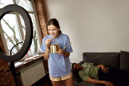 Sly girl make video about pour water on sleep guy